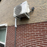 buitenunit mitsubishi montage zijkant woning